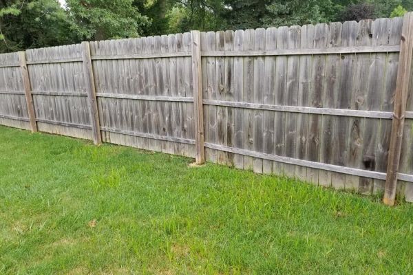 before fence pressure washing